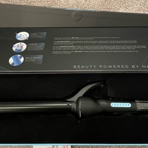 Brand new bio ionic long barrel (1.25" ) curling iron without box
